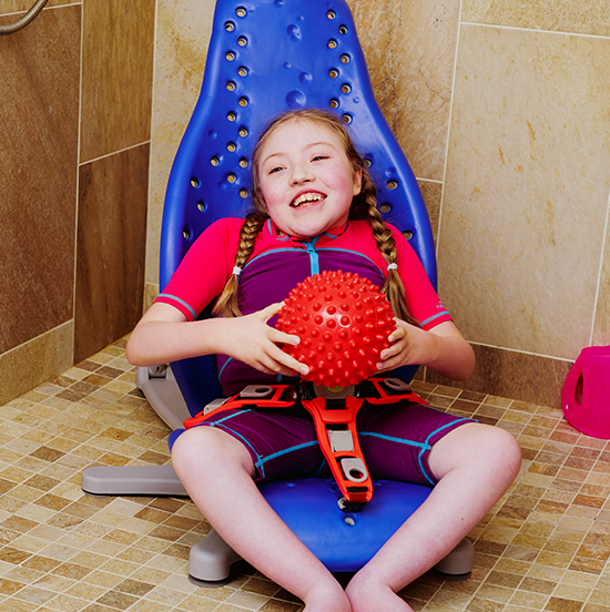 Siège de bain modulable Flamingo pour enfant handicapé